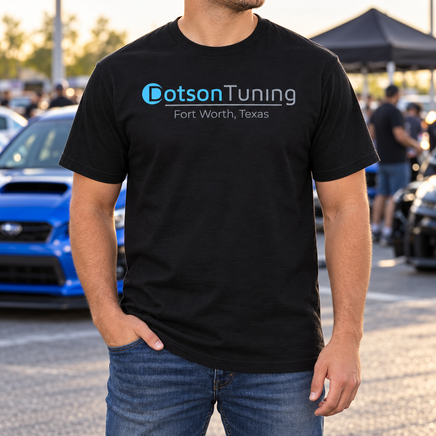 Black Dotson Tuning T-shirt showing the blue and gray chest logo and Fort Worth, Texas print at a car meet.